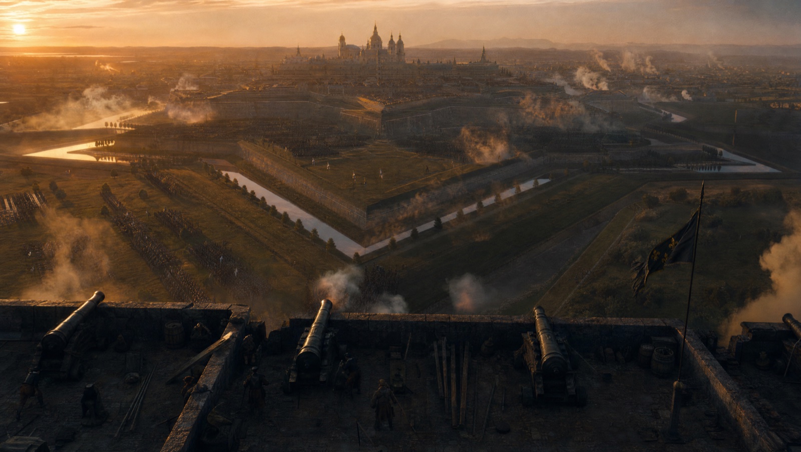 The bastioned Citadelle de Montfaucon seen through smoke at dusk