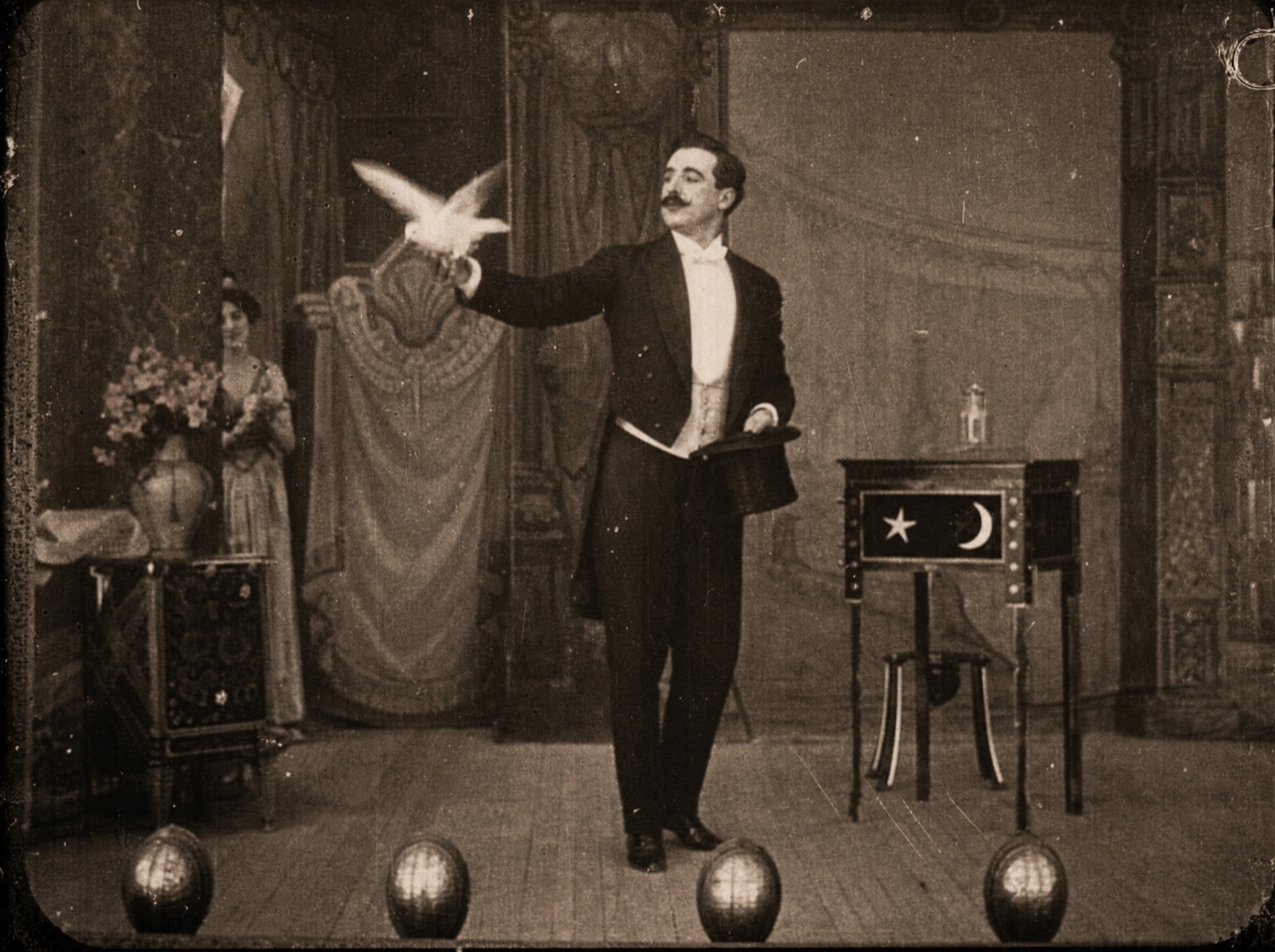 A 1907 silver-nitrate picture of magician Monsieur Bellini producing a white dove
