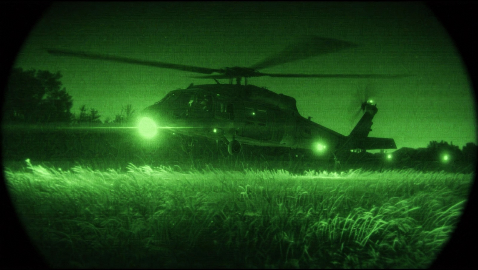 A fictional rescue helicopter hovering low over a dark field at night
